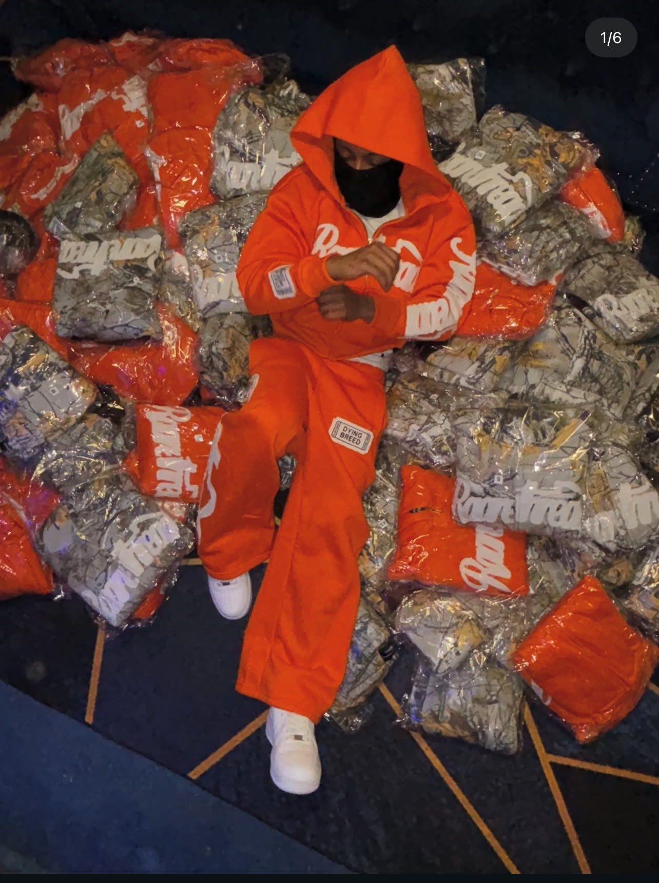 “STAY RARE MOST ARE COPIES“ ORANGE JACKET